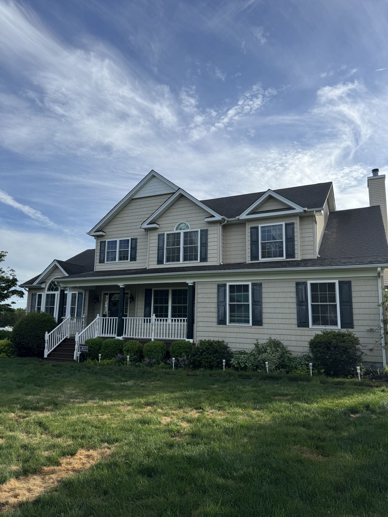 Side of home with porch